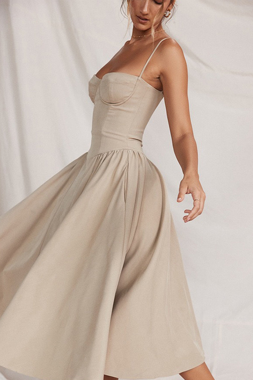 Beige satijnen midi dress met bustier top en zwierig rokgedeelte