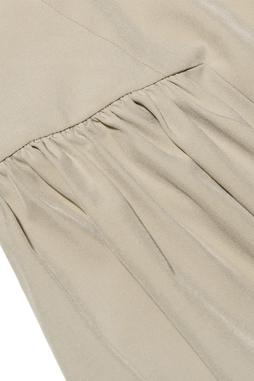 Beige satijnen midi dress met bustier top en zwierig rokgedeelte