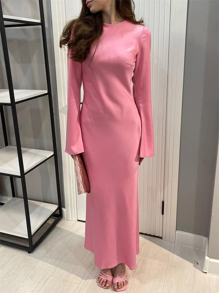 Aurora roze maxi jurk met lange mouwen en luxe uitstraling