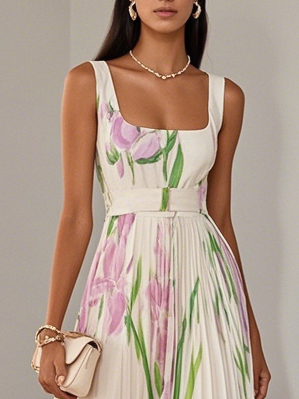Isabella witte chiffon maxi jurk met bloemenprint en plissé rok