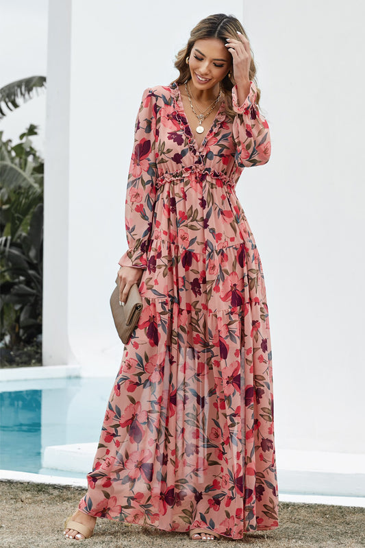 rouw draagt een crème bloemen maxi-jurk met rode en groene accenten, V-hals en lange mouwen, perfect voor zomer en bruiloft