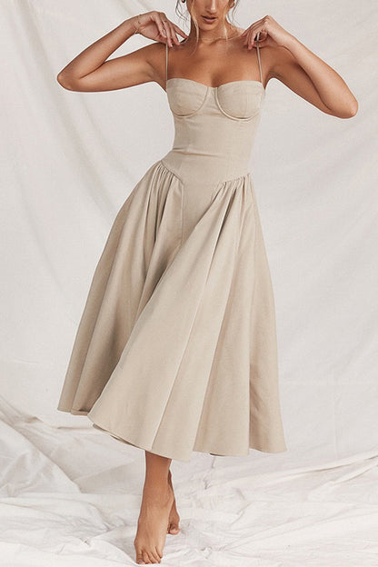 Beige satijnen midi dress met bustier top en zwierig rokgedeelte