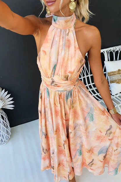 Zomerse dames maxi-jurk met halternek, open rug en kleurrijke waterverfprint