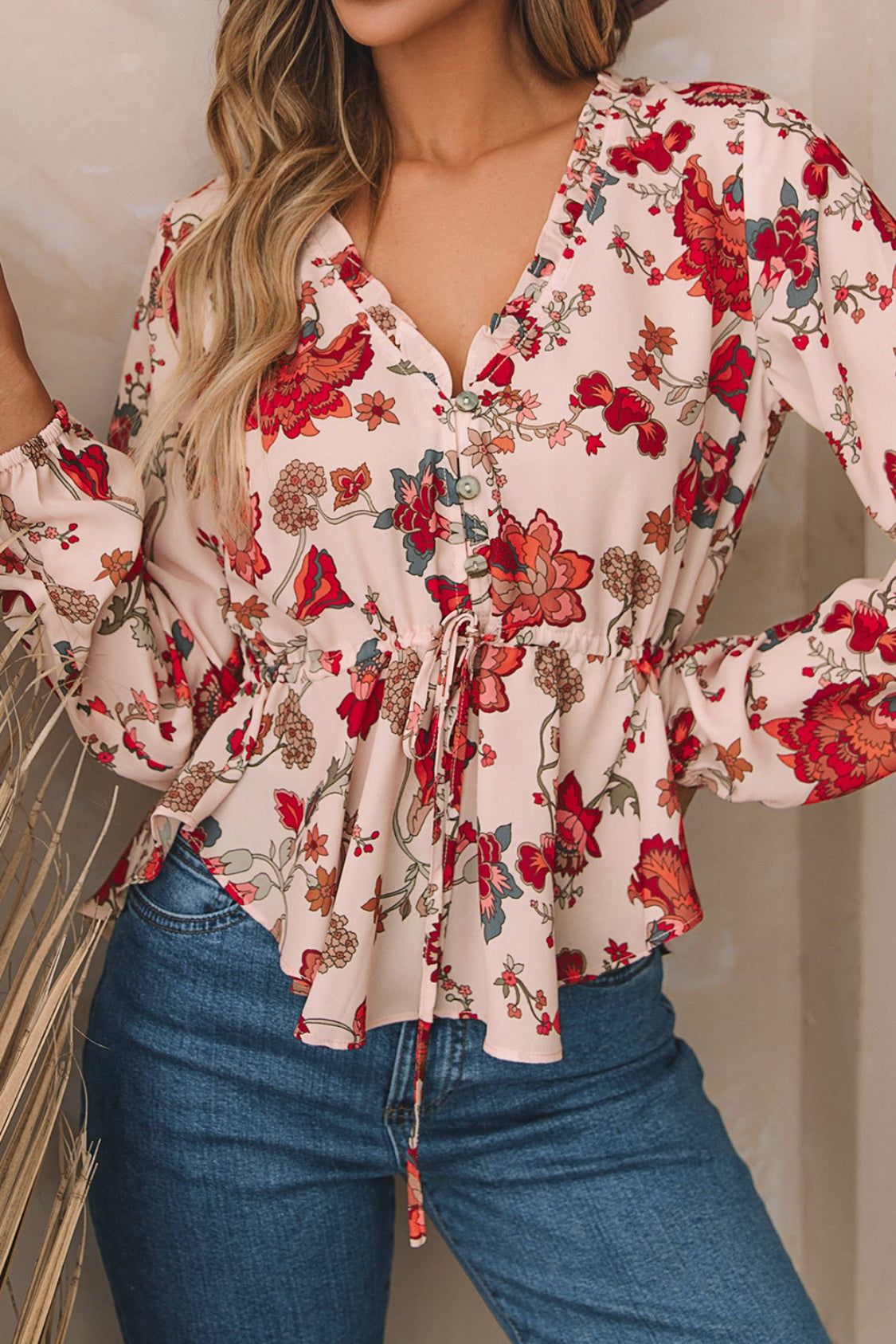 roze-bloemen-blouse-met-taillekoord.jpg