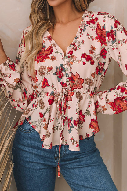 roze-bloemen-blouse-met-taillekoord.jpg