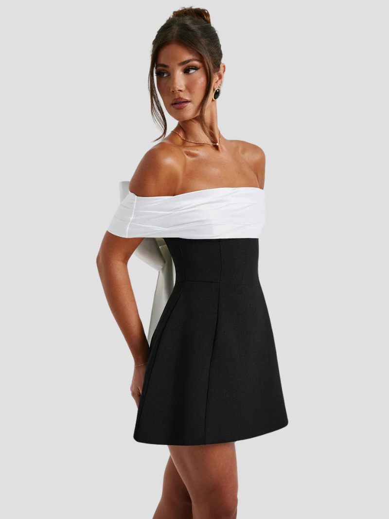 Anouk zwart-witte off-shoulder mini jurk met strikdetail – vooraanzicht