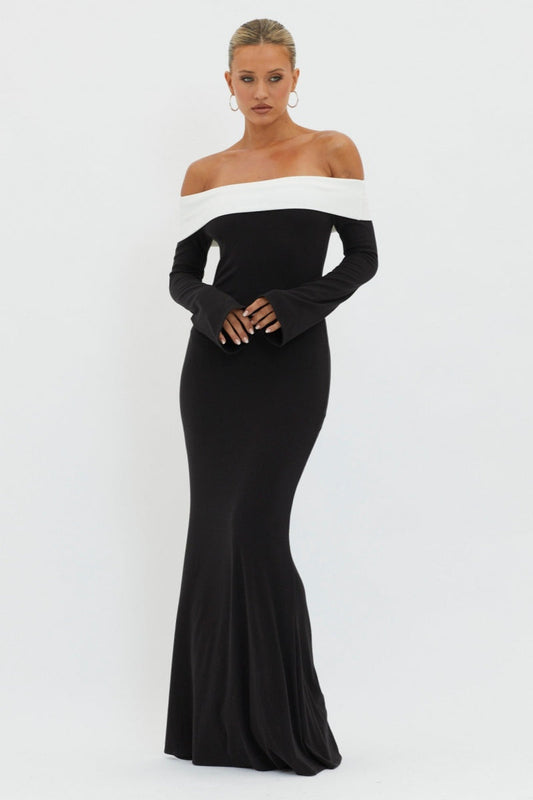Zwarte off-shoulder maxi jurk met lange mouwen van elastische knit stof – elegante damesjurk voor gala, diner en formele gelegenheden.