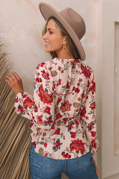 roze-bloemen-blouse-met-taillekoord.jpg